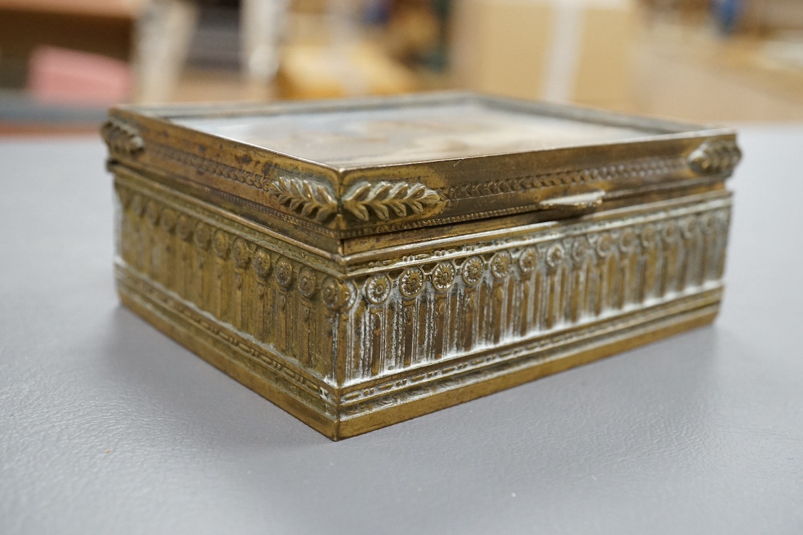 A 19th century French brass hinged box, with inset painted porcelain cover depicting the birth of Venus, 9cm wide. Condition - fair/good